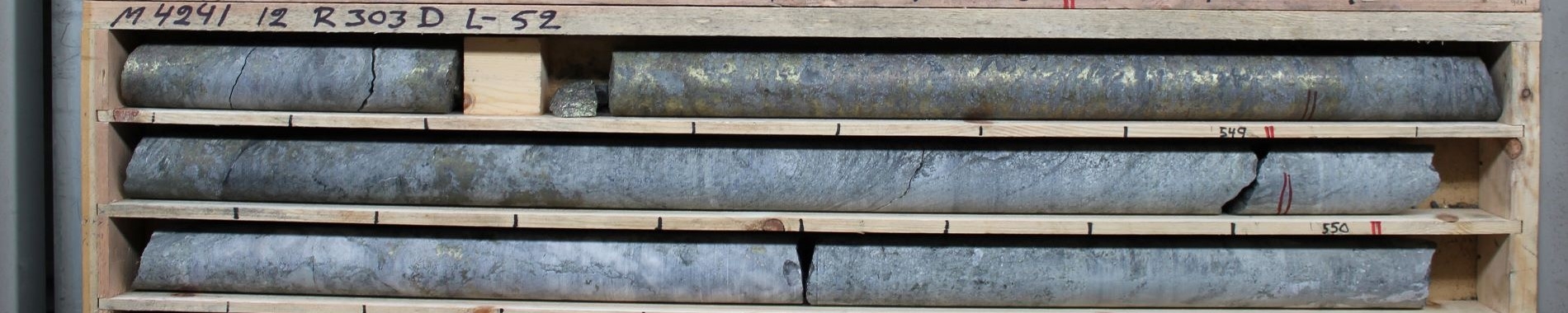 image of base metal samples on wooden shelving